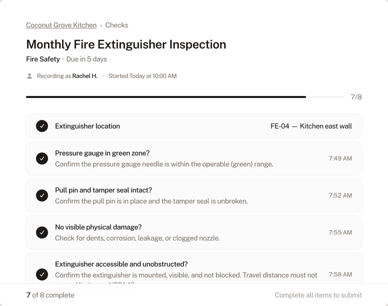 Check completion form showing a fire alarm test in progress